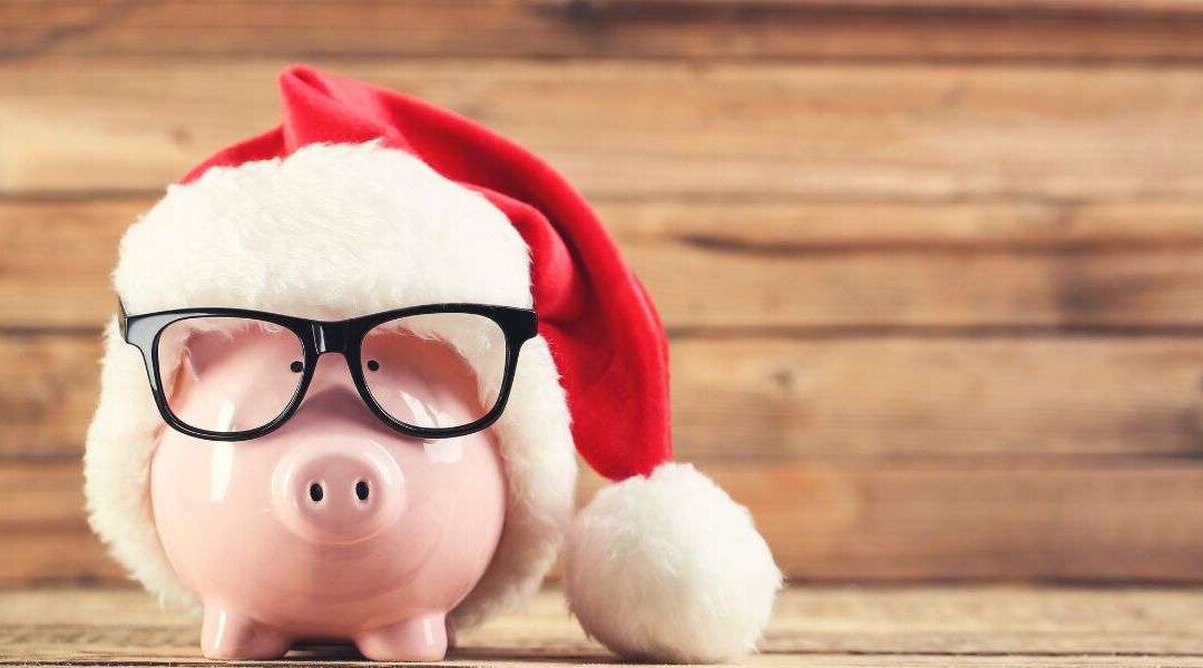 Piggy bank in Santa Hat and glasses